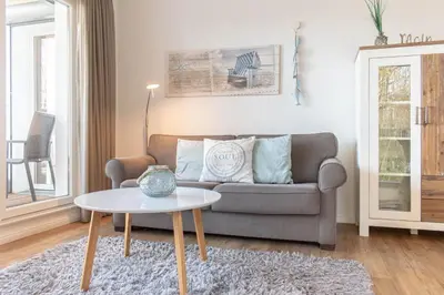 Ein Sitzbereich in der Unterkunft Ferienwohnung Strandvilla Augustusbad 17