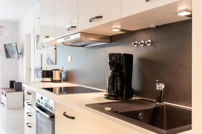 Küche/Küchenzeile in der Unterkunft Ferienwohnung Strandvilla Augustusbad 14