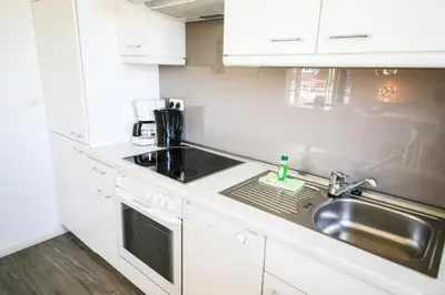 Küche/Küchenzeile in der Unterkunft Ferienwohnung Strandliebe