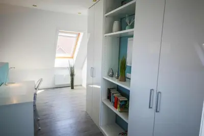 Ein Bett oder Betten in einem Zimmer der Unterkunft Ferienwohnung Strandliebe