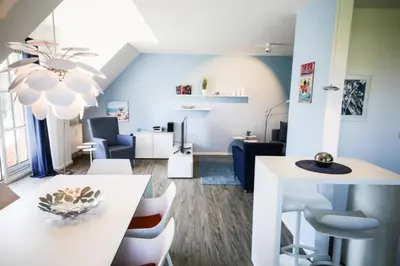 Ein Sitzbereich in der Unterkunft Ferienwohnung Strandliebe