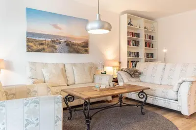 Ein Sitzbereich in der Unterkunft Ferienwohnung Villa Miramare