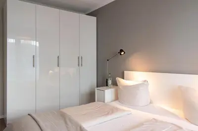Ein Bett oder Betten in einem Zimmer der Unterkunft Ferienwohnung Stranderlebnis