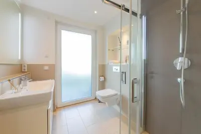 Ein Badezimmer in der Unterkunft Ferienwohnung Stranderlebnis