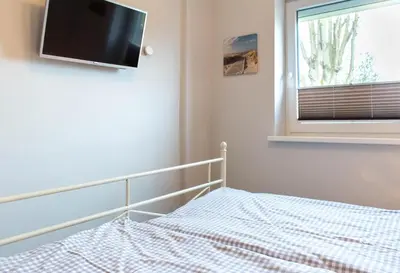 Ein Bett oder Betten in einem Zimmer der Unterkunft Ferienwohnung Traumland 2