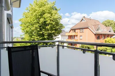 Ein Balkon oder eine Terrasse in der Unterkunft Ferienwohnung Sunshine Beachhouse 111