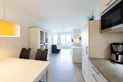 TV/Unterhaltungsangebot in der Unterkunft Ferienwohnung Sunshine Beachhouse 111
