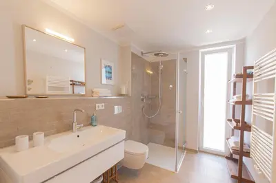 Ein Badezimmer in der Unterkunft Ferienwohnung STRANDraum