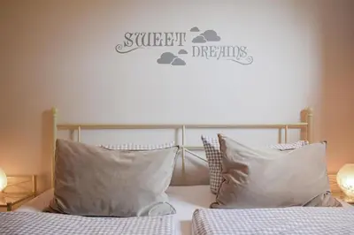 Ein Bett oder Betten in einem Zimmer der Unterkunft Ferienwohnung Traumland 1