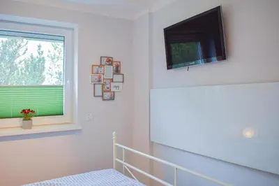 Ein Bett oder Betten in einem Zimmer der Unterkunft Ferienwohnung Traumland 1