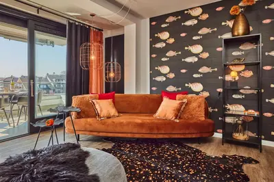 Ein Sitzbereich in der Unterkunft Ferienwohnung Sundown