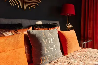 Ein Bett oder Betten in einem Zimmer der Unterkunft Ferienwohnung Sundown