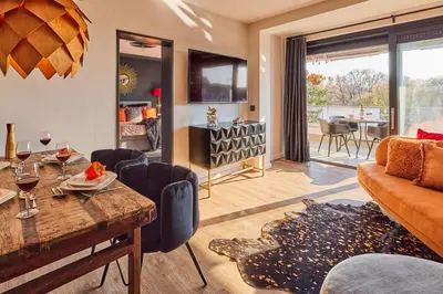 Ein Sitzbereich in der Unterkunft Ferienwohnung Sundown