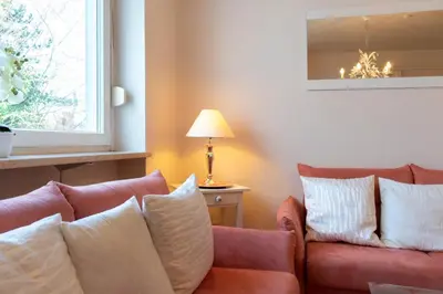 Ein Sitzbereich in der Unterkunft Ferienwohnung Beach Suite