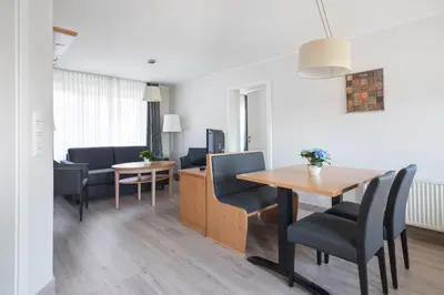 Ein Sitzbereich in der Unterkunft Apartmenthaus Seehof