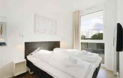 Ein Bett oder Betten in einem Zimmer der Unterkunft Highend Travemünde - Whg 214