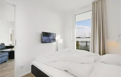 Ein Bett oder Betten in einem Zimmer der Unterkunft Highend Travemünde - Whg 306