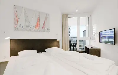 Ein Bett oder Betten in einem Zimmer der Unterkunft Highend Travemünde - Whg 207