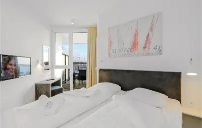 Ein Bett oder Betten in einem Zimmer der Unterkunft Highend Travemünde - Whg 314