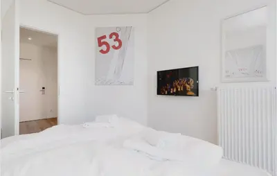 Ein Bett oder Betten in einem Zimmer der Unterkunft Highend Travemünde - Whg 413