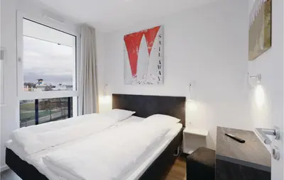 Ein Bett oder Betten in einem Zimmer der Unterkunft Highend Travemünde - Whg 416