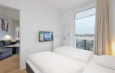 Ein Bett oder Betten in einem Zimmer der Unterkunft Highend Travemünde - Whg 416