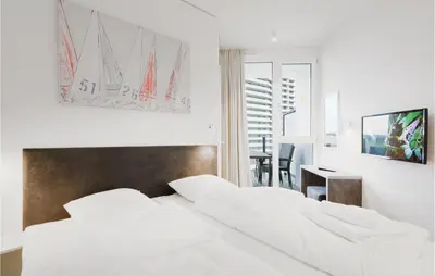 Ein Bett oder Betten in einem Zimmer der Unterkunft Highend Travemünde - Whg 507