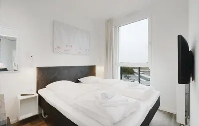 Ein Bett oder Betten in einem Zimmer der Unterkunft Highend Travemünde - Whg 507