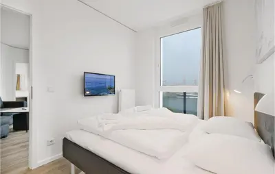 Ein Bett oder Betten in einem Zimmer der Unterkunft Highend Travemünde - Whg 514