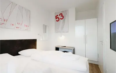 Ein Bett oder Betten in einem Zimmer der Unterkunft Highend Travemünde - Whg 604
