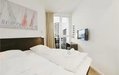 Ein Bett oder Betten in einem Zimmer der Unterkunft Highend Travemünde - Whg 409
