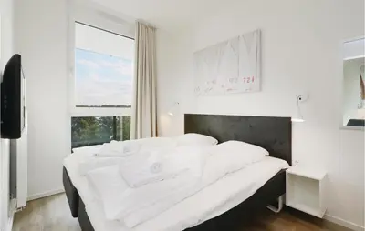 Ein Bett oder Betten in einem Zimmer der Unterkunft Highend Travemünde - Whg 412