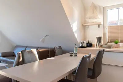 Ein Sitzbereich in der Unterkunft Ferienwohnung Ostseerauschen 2