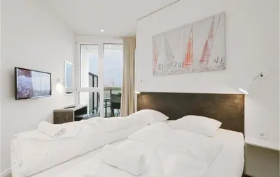 Ein Bett oder Betten in einem Zimmer der Unterkunft Highend Travemünde - Whg 510
