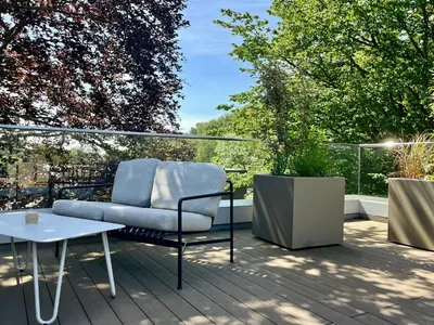 Ein Sitzbereich in der Unterkunft White Pearl Apartment 4 01