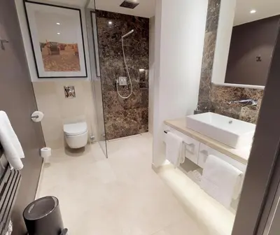 Ein Badezimmer in der Unterkunft White Pearl Apartment 2.09