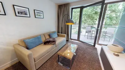 Ein Sitzbereich in der Unterkunft White Pearl Apartment 2.09