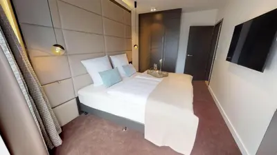 Ein Bett oder Betten in einem Zimmer der Unterkunft White Pearl Apartment 3.03