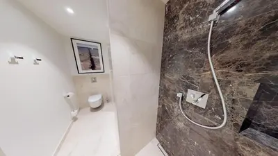 Ein Badezimmer in der Unterkunft White Pearl Apartment 1.11