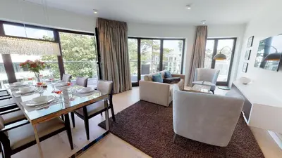 Ein Sitzbereich in der Unterkunft White Pearl Apartment 3.12