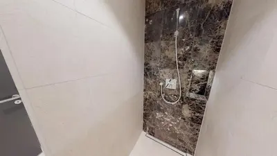 Ein Badezimmer in der Unterkunft White Pearl Apartment 3.11
