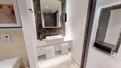 Ein Badezimmer in der Unterkunft White Pearl Apartment 2.12