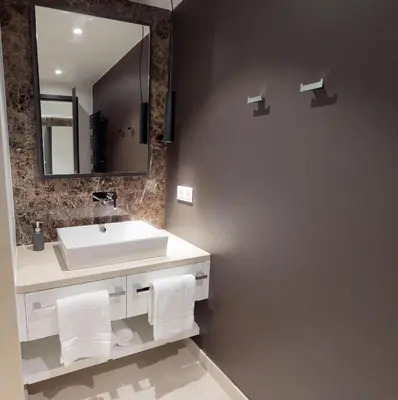 Ein Badezimmer in der Unterkunft White Pearl Apartment 2.10