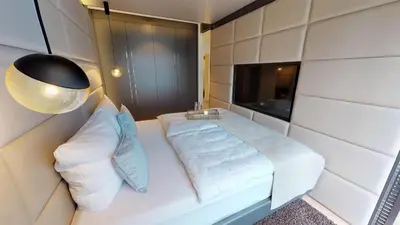 Ein Bett oder Betten in einem Zimmer der Unterkunft White Pearl Apartment 2.14