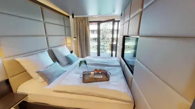 Ein Bett oder Betten in einem Zimmer der Unterkunft White Pearl Apartment 2.15