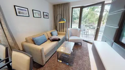 Ein Sitzbereich in der Unterkunft White Pearl Apartment 2.08