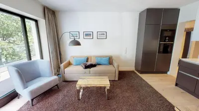 Ein Sitzbereich in der Unterkunft White Pearl Apartment 3.08