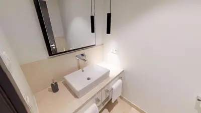 Ein Badezimmer in der Unterkunft White Pearl Apartment 0.04