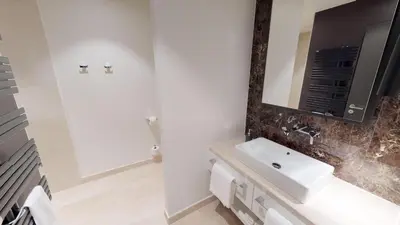 Ein Badezimmer in der Unterkunft White Pearl Apartment 0.11