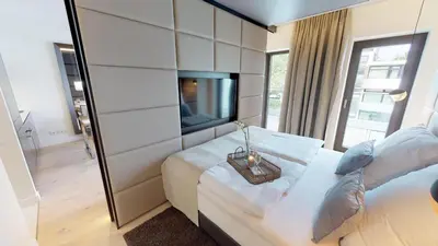 Ein Bett oder Betten in einem Zimmer der Unterkunft White Pearl Apartment 3.10